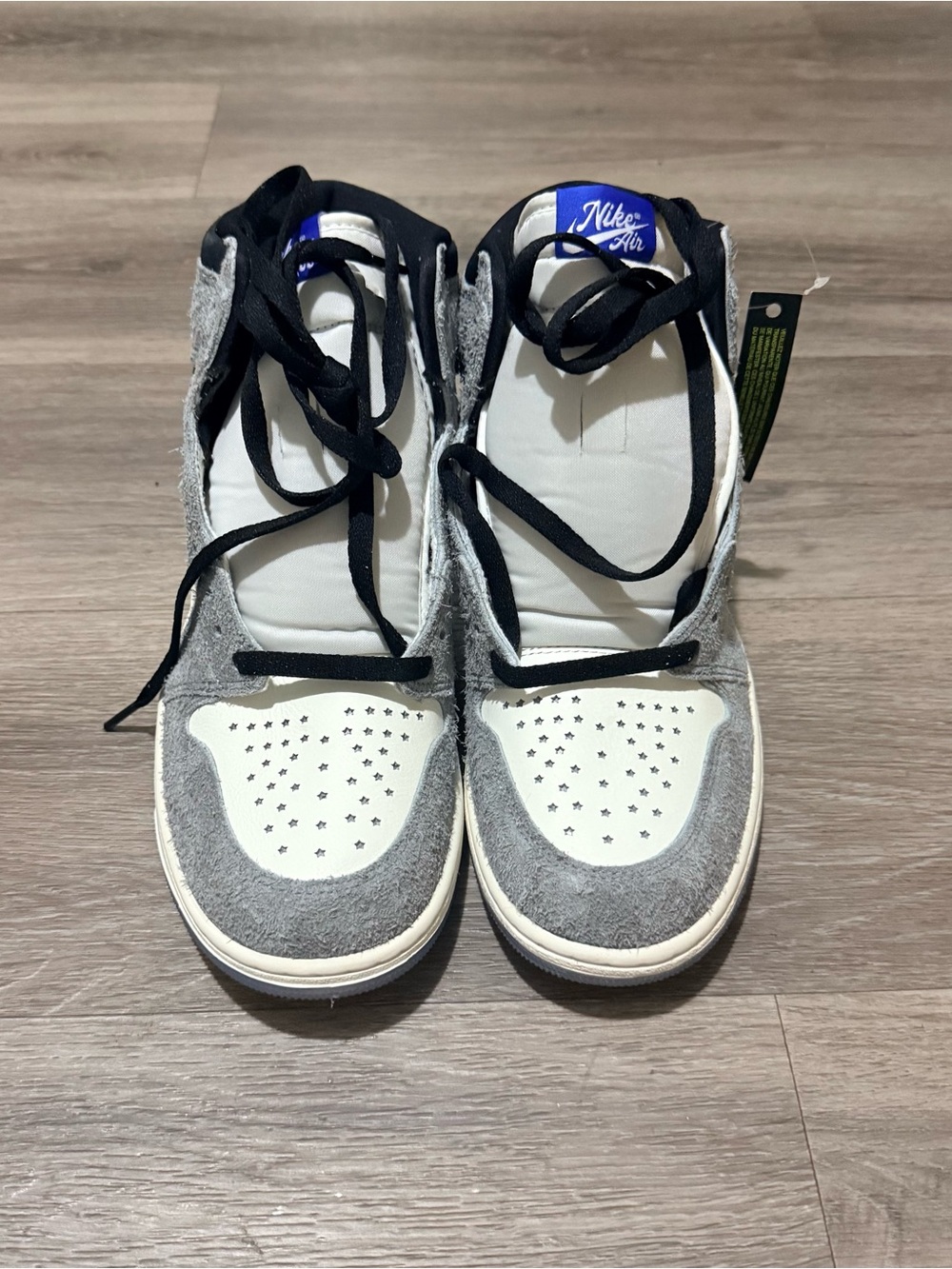 Jordan’s  Gray and White High Top Sneakers